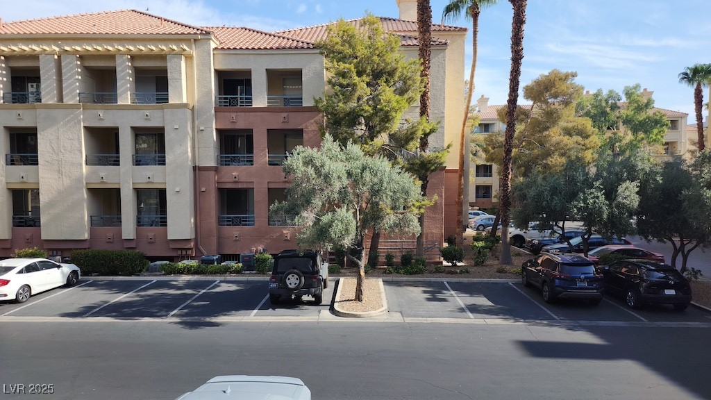 270 East Flamingo Road, Unit 133 Las Vegas, NV 89169 - Photo 11 of 13 View of property featuring uncovered parking