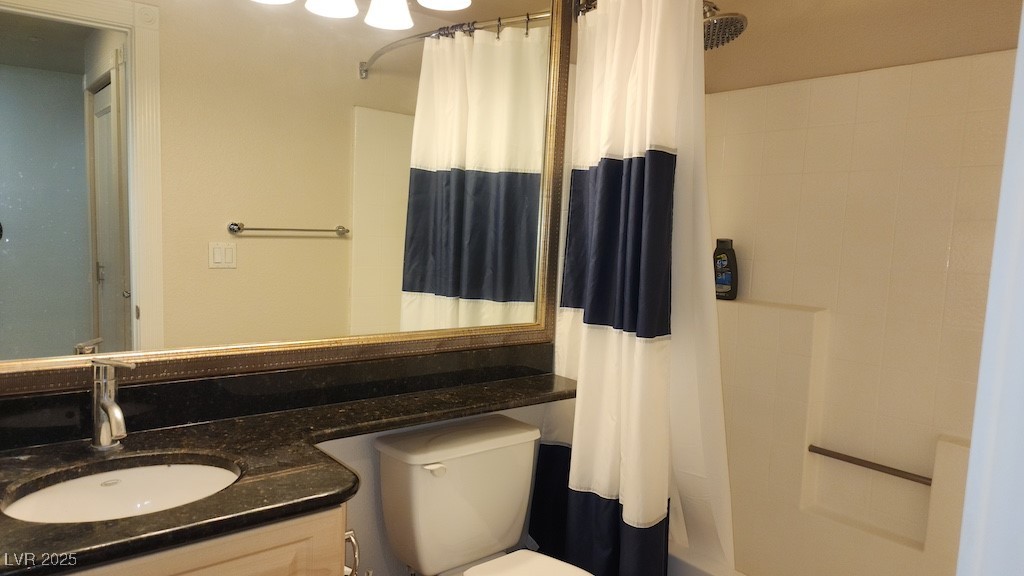 270 East Flamingo Road, Unit 133 Las Vegas, NV 89169 - Photo 5 of 13 Full bath with vanity and shower / bath combo with shower curtain