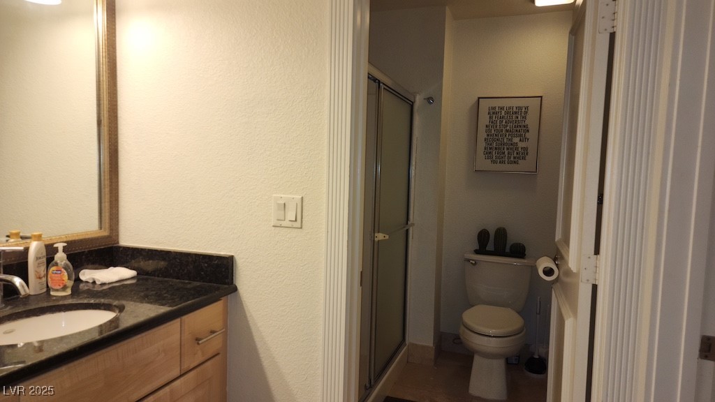 270 East Flamingo Road, Unit 133 Las Vegas, NV 89169 - Photo 9 of 13 Bathroom with vanity and a stall shower