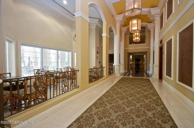 a view of swimming pool from a balcony