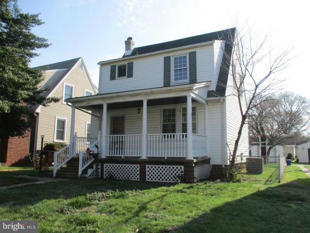 39 Township Road Baltimore, MD 21222 - Photo 1 of 24 a front view of a house with a yard
