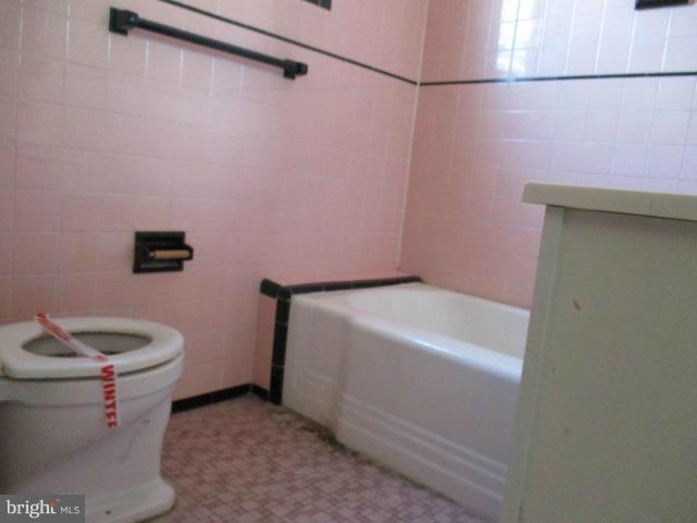 39 Township Road Baltimore, MD 21222 - Photo 13 of 24 a bathroom with a sink and toilet
