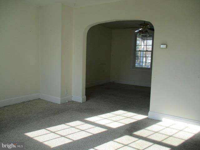 39 Township Road Baltimore, MD 21222 - Photo 3 of 24 an empty room with windows