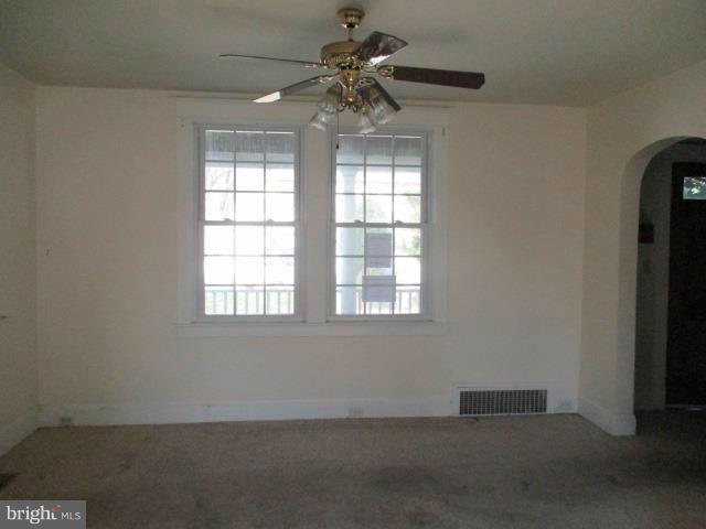 39 Township Road Baltimore, MD 21222 - Photo 5 of 24 an empty room with a window