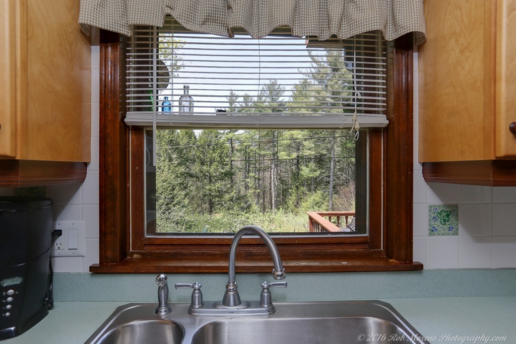 65 Colony Road Phillipston, MA 01331 - Photo 12 of 26 a bathroom with a sink next to a window