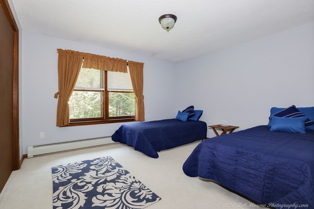 65 Colony Road Phillipston, MA 01331 - Photo 14 of 26 a bedroom with two beds and a window
