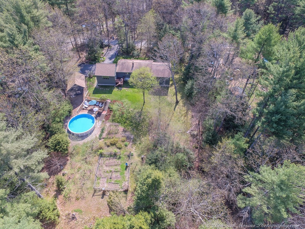 65 Colony Road Phillipston, MA 01331 - Photo 23 of 26 a backyard of a house with lots of green space
