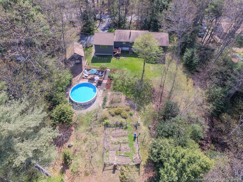 65 Colony Road Phillipston, MA 01331 - Photo 24 of 26 a backyard of a house with outdoor seating