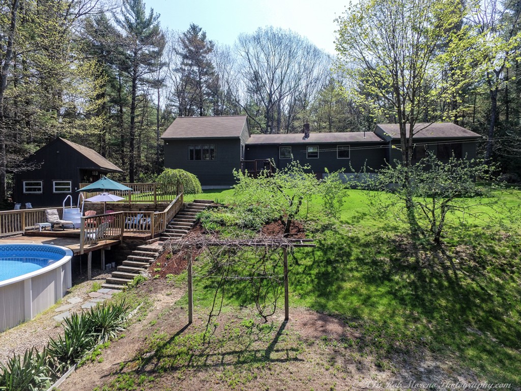 65 Colony Road Phillipston, MA 01331 - Photo 3 of 26 a garden view with a seating space