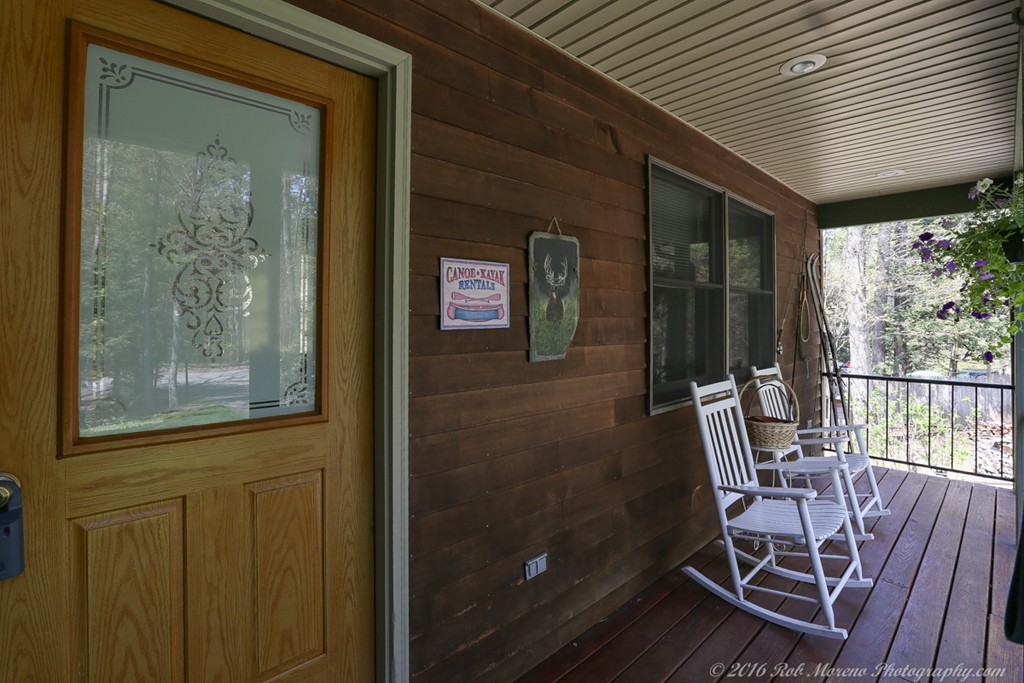 65 Colony Road Phillipston, MA 01331 - Photo 4 of 26 a view of a balcony with chairs and floor to ceiling window
