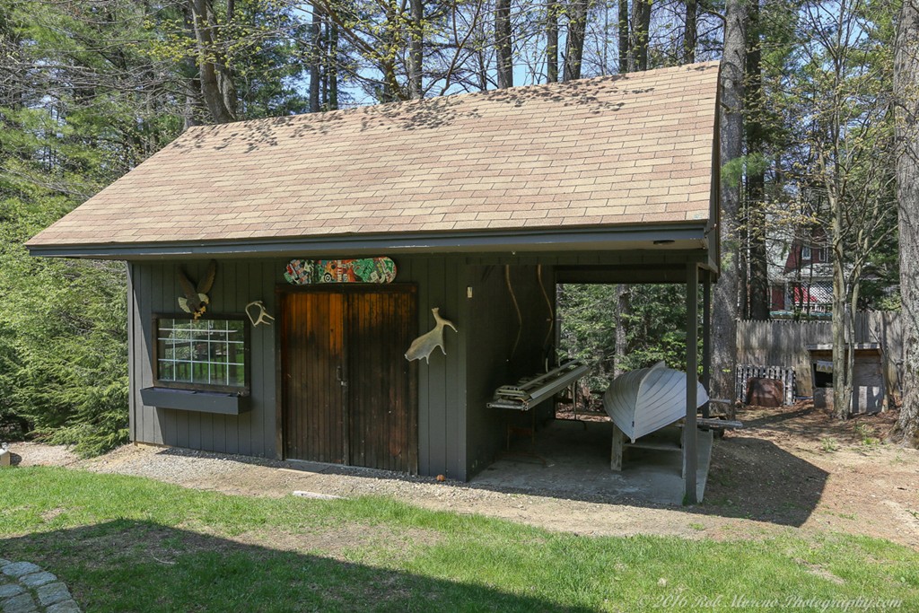 65 Colony Road Phillipston, MA 01331 - Photo 5 of 26 a backyard of a house with glass top table and chairs