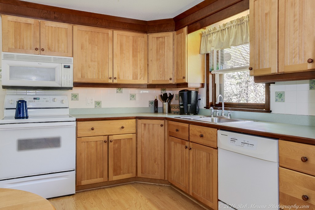 65 Colony Road Phillipston, MA 01331 - Photo 10 of 26 a kitchen with granite countertop white cabinets and white appliances