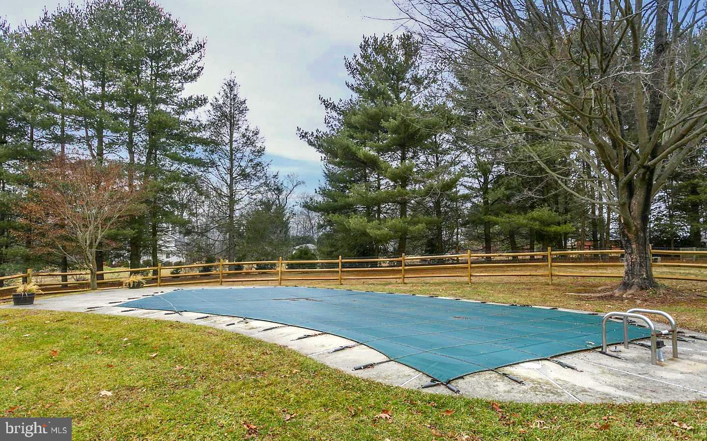 17208 Hunter Green Road Upperco, MD 21155 - Photo 5 of 7 a view of a swimming pool with an outdoor space and seating area
