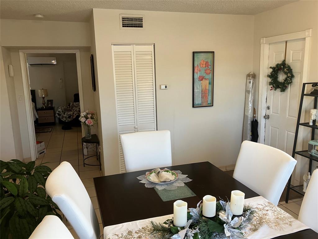 7960 Northwest 174th Street Hialeah, FL 33015 - Photo 14 of 20 a living room with furniture and wooden floor