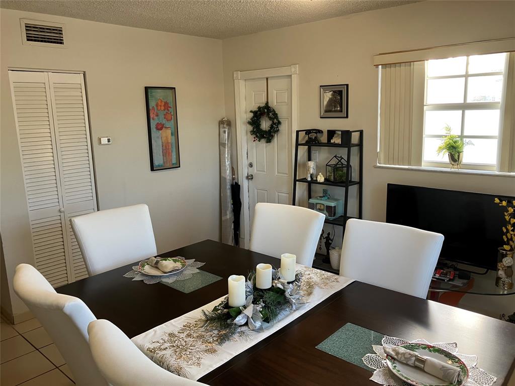 7960 Northwest 174th Street Hialeah, FL 33015 - Photo 15 of 20 a living room with furniture and window