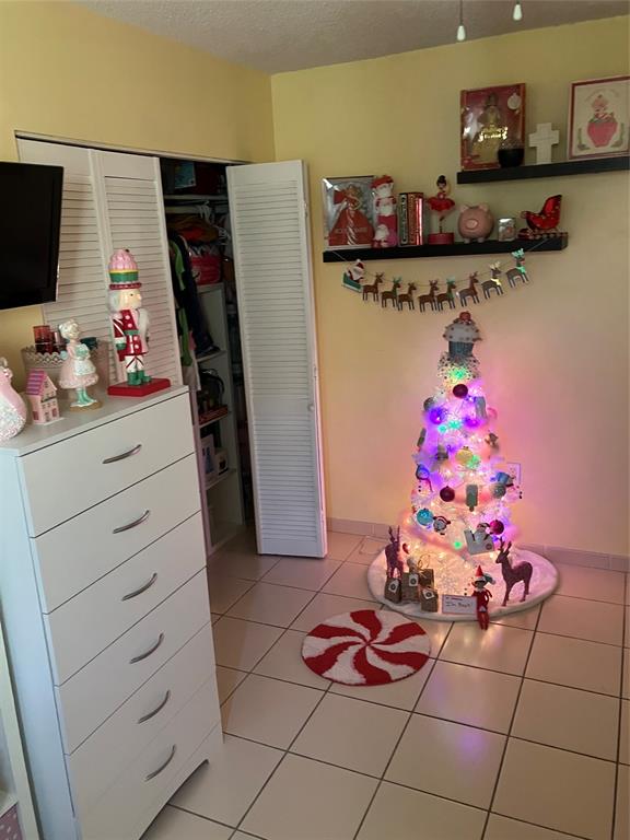 7960 Northwest 174th Street Hialeah, FL 33015 - Photo 6 of 20 a kitchen with a refrigerator and cabinets