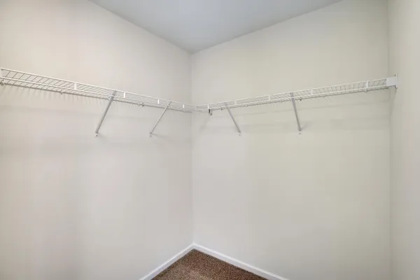 a view of a room with racks on the wall