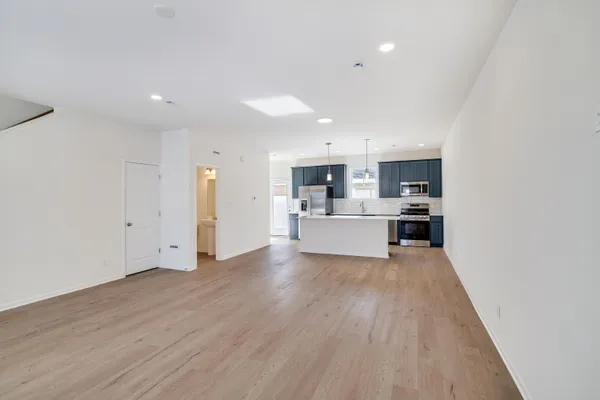 a view of kitchen with wooden floor