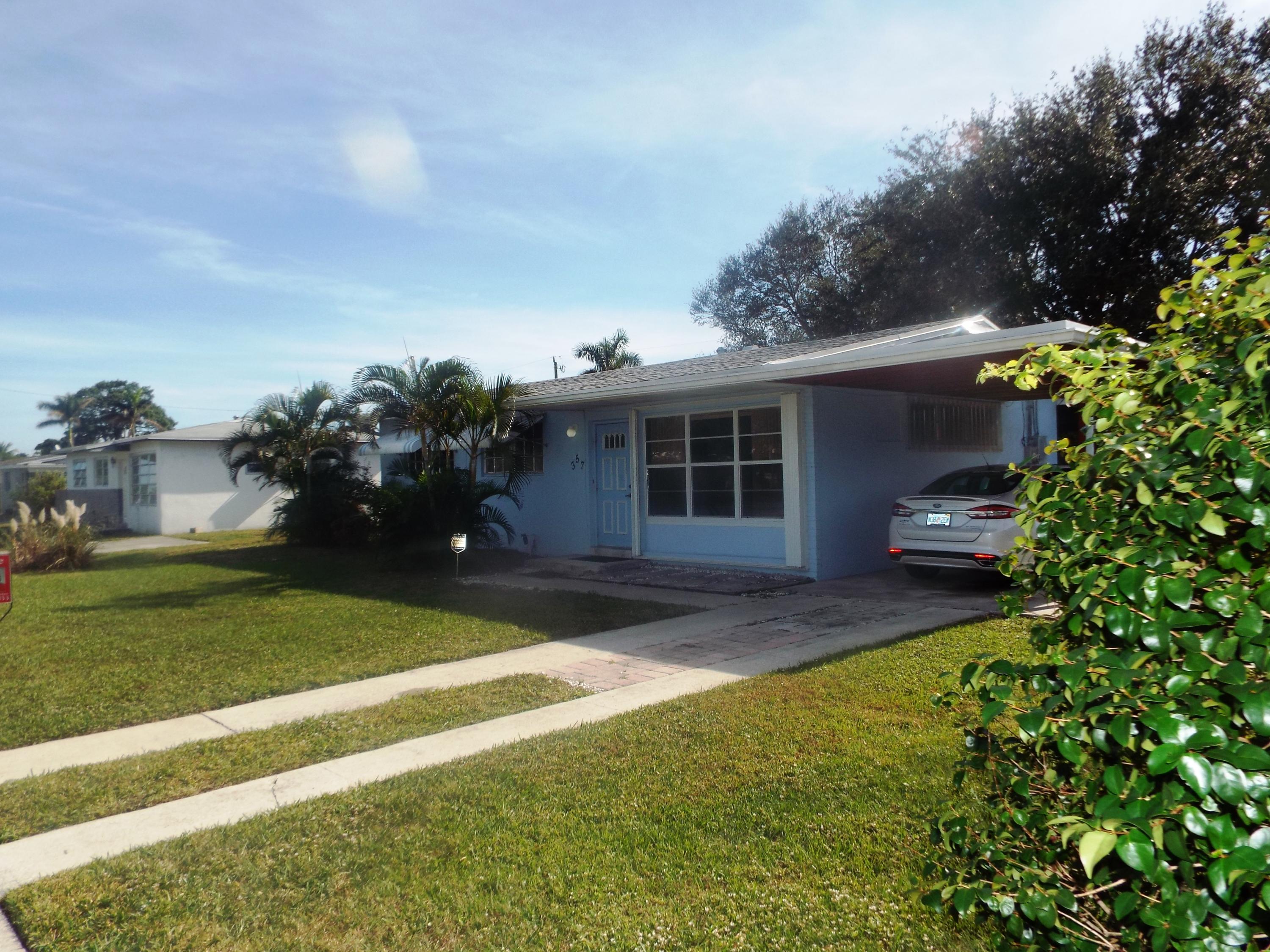 357 East Lake Road Palm Springs, FL 33461 - Photo 1 of 4 FRONT