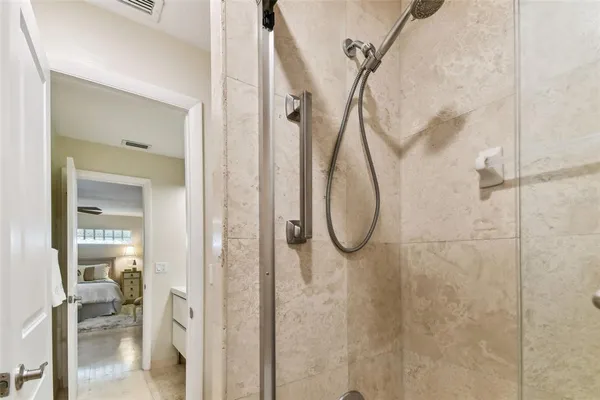 a view of a swimming pool with a lounge chairs