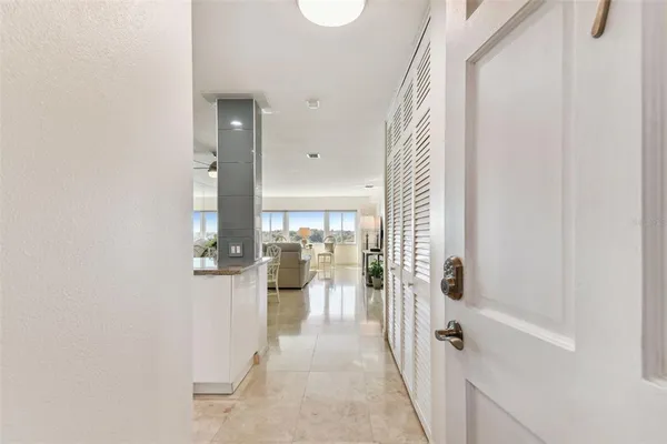 a kitchen with stainless steel appliances granite countertop a stove and a microwave