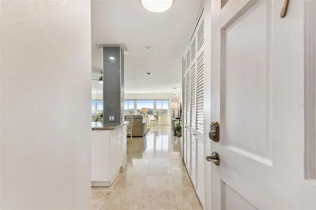 a kitchen with stainless steel appliances granite countertop a stove and a microwave