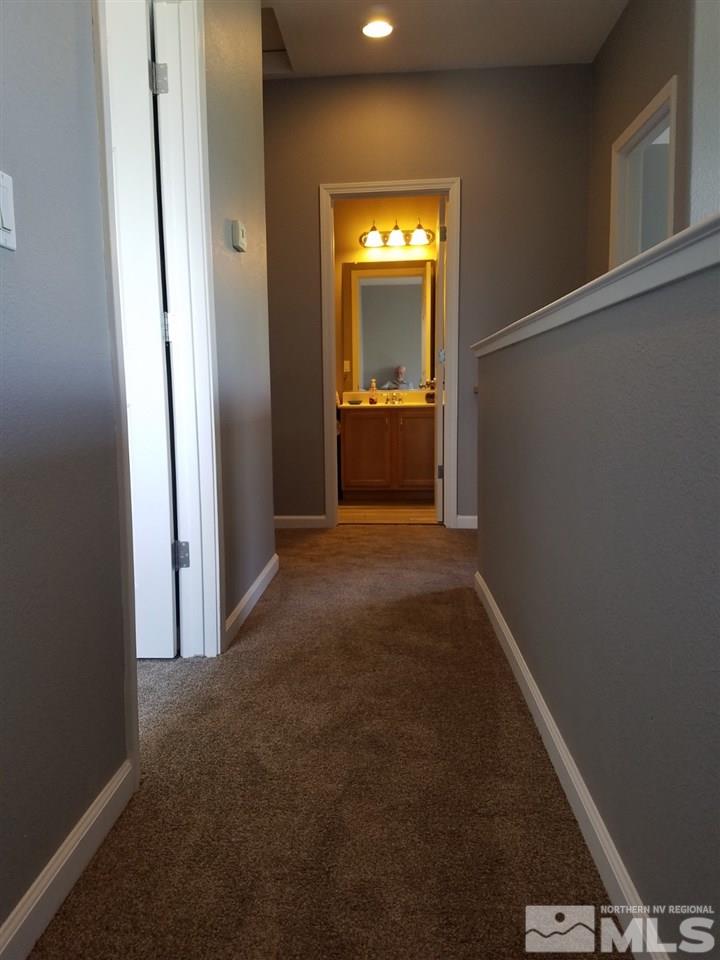 2198 Stanton Lane Reno, NV 89502 - Photo 5 of 9 a view of a hallway to a room with a bathroom