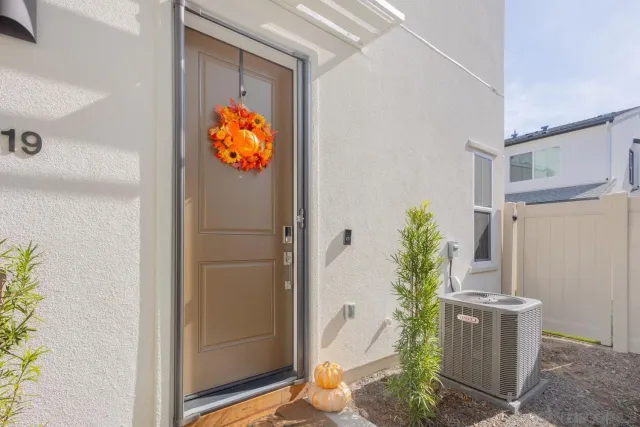 a view of a livingroom with an empty space and wooden floor