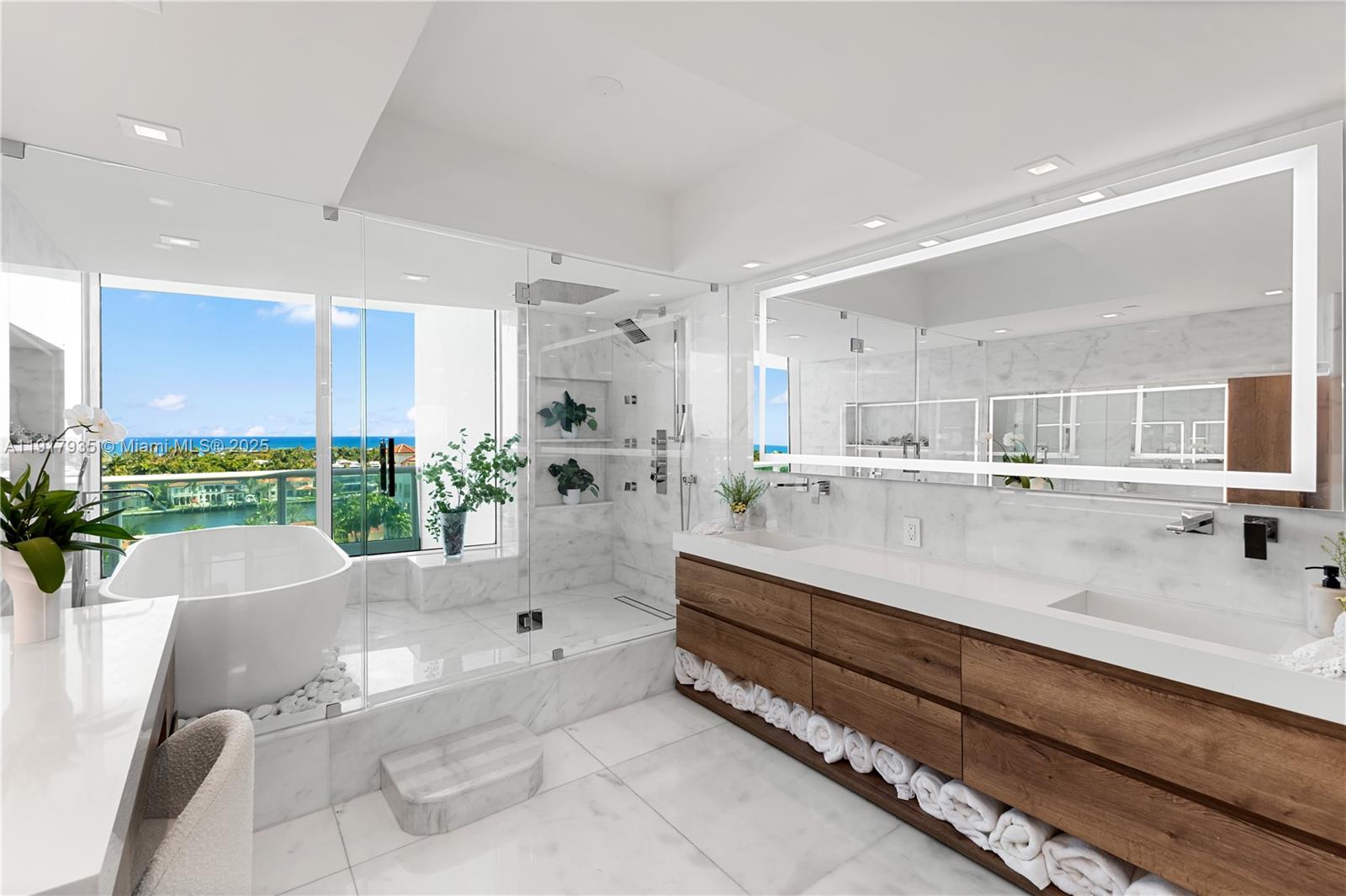 19955 Northeast 38th Court, Unit 1103 Aventura, FL 33180 - Photo 20 of 43 a living room with furniture and a large window