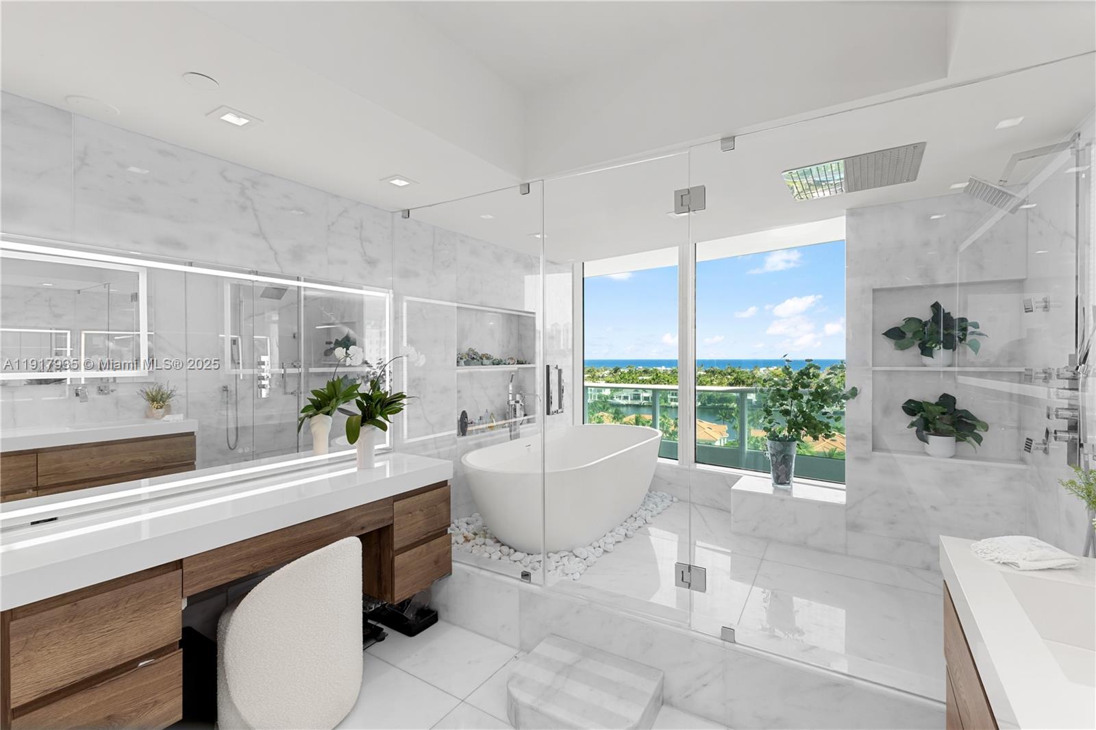 19955 Northeast 38th Court, Unit 1103 Aventura, FL 33180 - Photo 21 of 43 a living room with furniture and potted plants