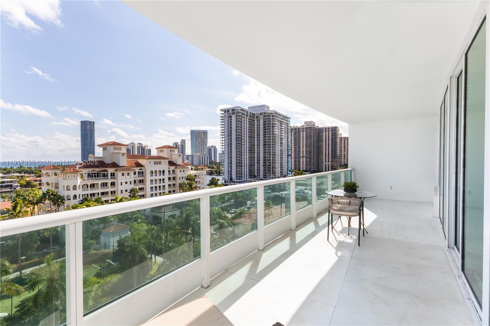 19955 Northeast 38th Court, Unit 1103 Aventura, FL 33180 - Photo 40 of 43 a view of city from a balcony