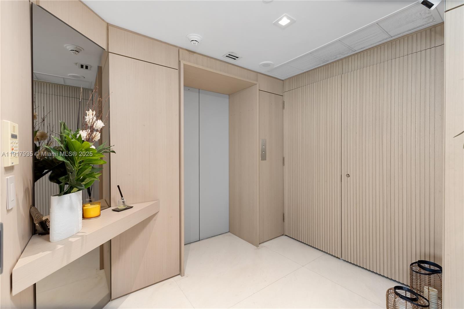 19955 Northeast 38th Court, Unit 1103 Aventura, FL 33180 - Photo 43 of 43 a view of entryway with a potted plant