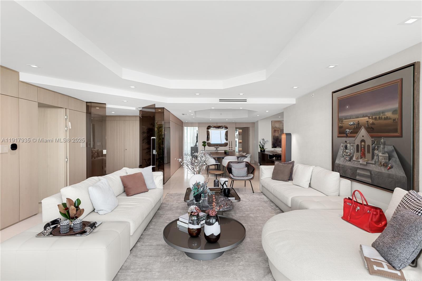 19955 Northeast 38th Court, Unit 1103 Aventura, FL 33180 - Photo 7 of 43 a living room with furniture and a large window