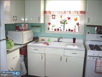 2516 Prescott Road Havertown, PA 19083 - Photo 4 of 6 a kitchen with a sink and cabinets