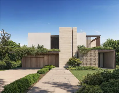 a view of a pathway with a wrought fence