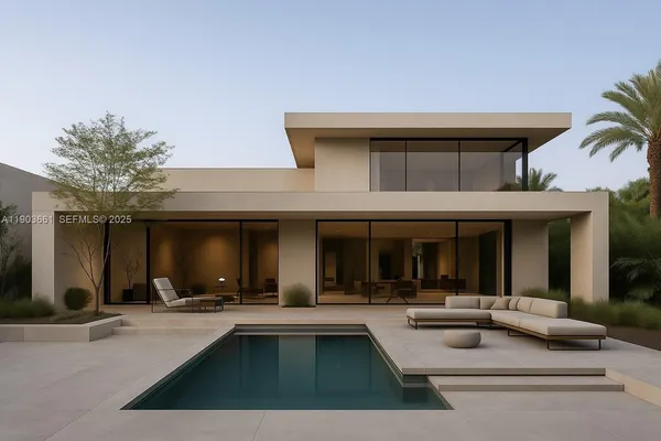 a view of a building with couches table and chairs
