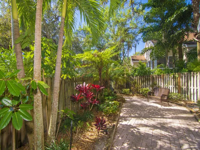 a backyard of a house with lots of green space