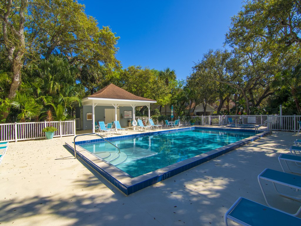 8785 Lakeside Boulevard Vero Beach, FL 32963 - Photo 27 of 36 a view of a house with swimming pool