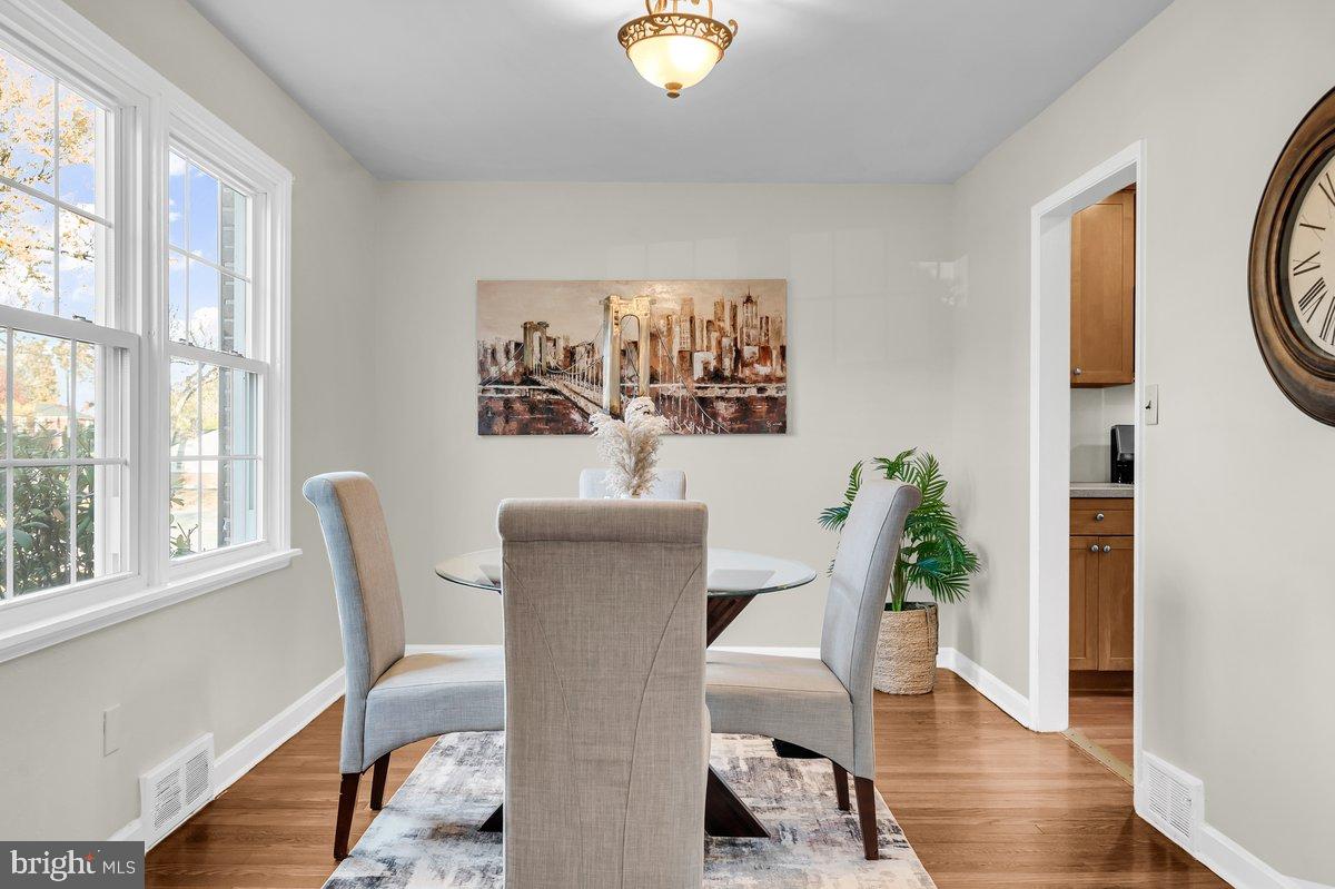 250 Potomac Road Wilmington, DE 19803 - Photo 11 of 26 a view of a dining room with furniture window and wooden floor
