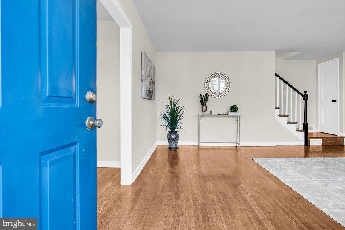 250 Potomac Road Wilmington, DE 19803 - Photo 4 of 26 a view of an entryway with wooden floor