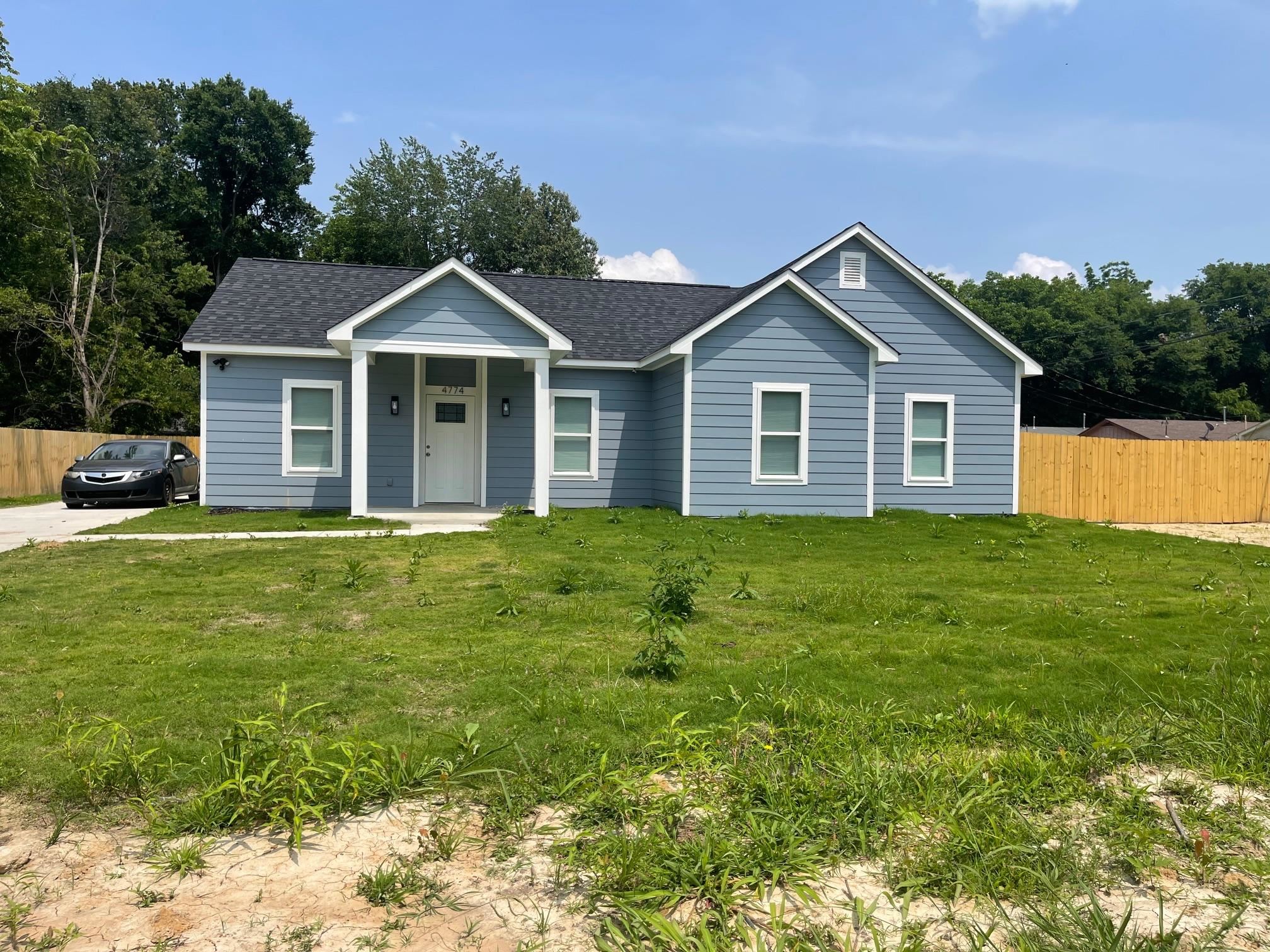 4774 12th Road Memphis, TN 38109 - Photo 1 of 1 a front view of house with yard and green space