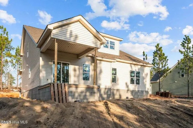 aerial view of residential houses with outdoor space