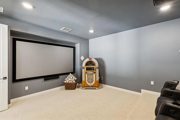 a room with gym equipment and a mirror