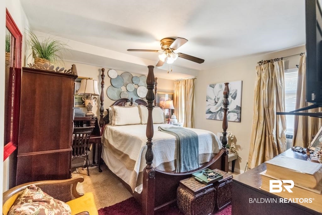 109 Esplanade Avenue Mobile, AL 36606 - Photo 19 of 45 Carpeted bedroom featuring ceiling fan