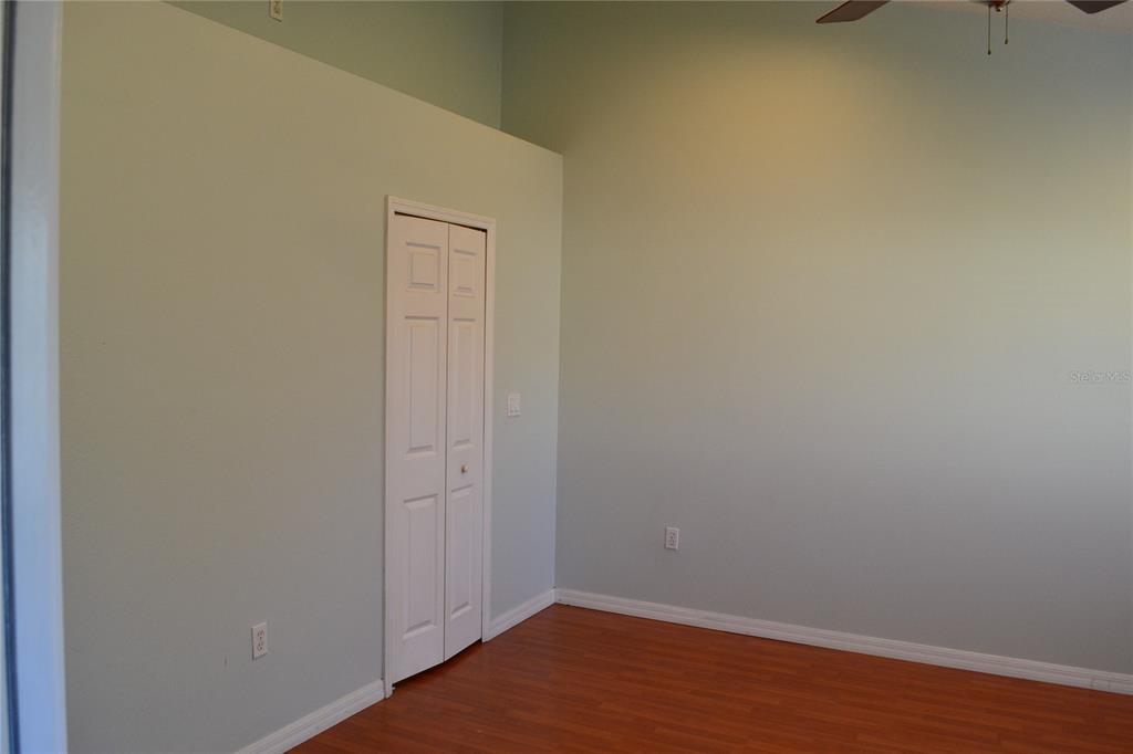 11235 Kapok Grand Circle Madeira Beach, FL 33708 - Photo 11 of 34 a view of an empty room
