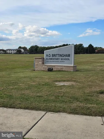 a view of sign board with an outdoor space