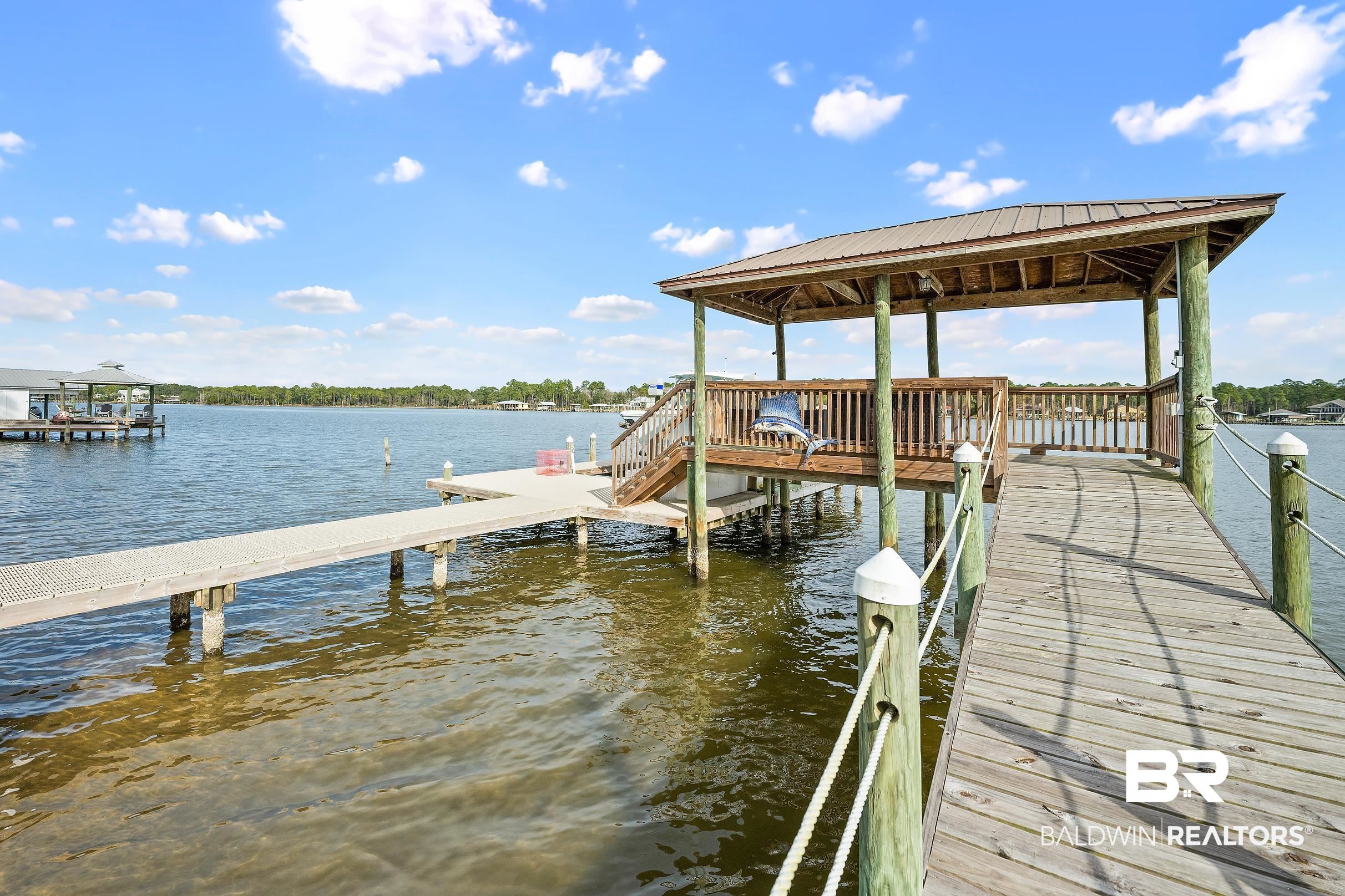 8490 Bay View Drive Foley, AL 36535 - Photo 12 of 67 Dock with a water view and a gazebo