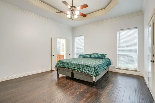 a bathroom with a tub a sink shower and mirror