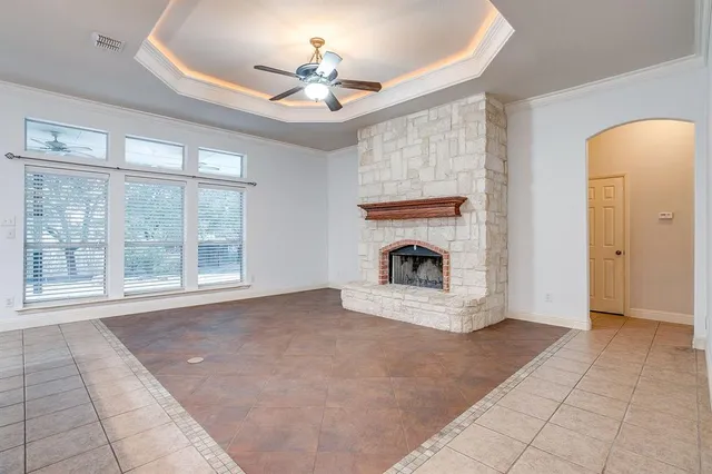 a view of a kitchen with a sink and a window