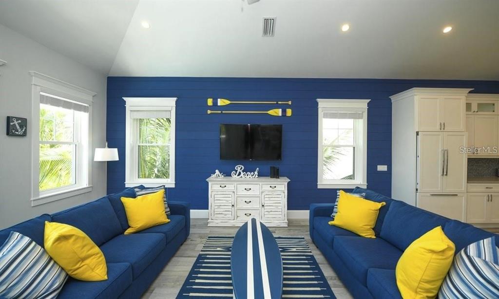 212 Spring Avenue Anna Maria, FL 34216 - Photo 5 of 31 a living room with furniture fireplace and window